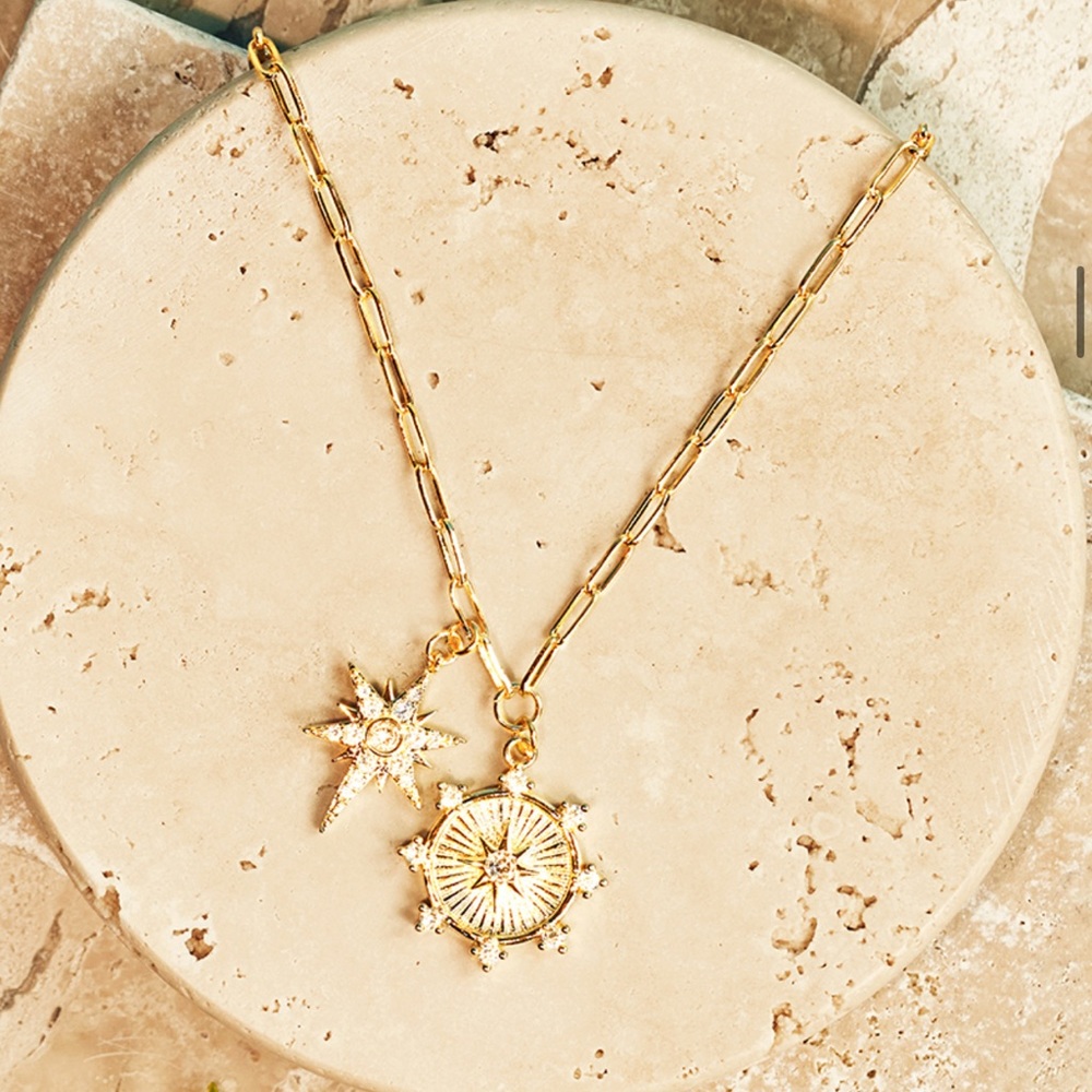 Jennifer Miller starburst charm necklace